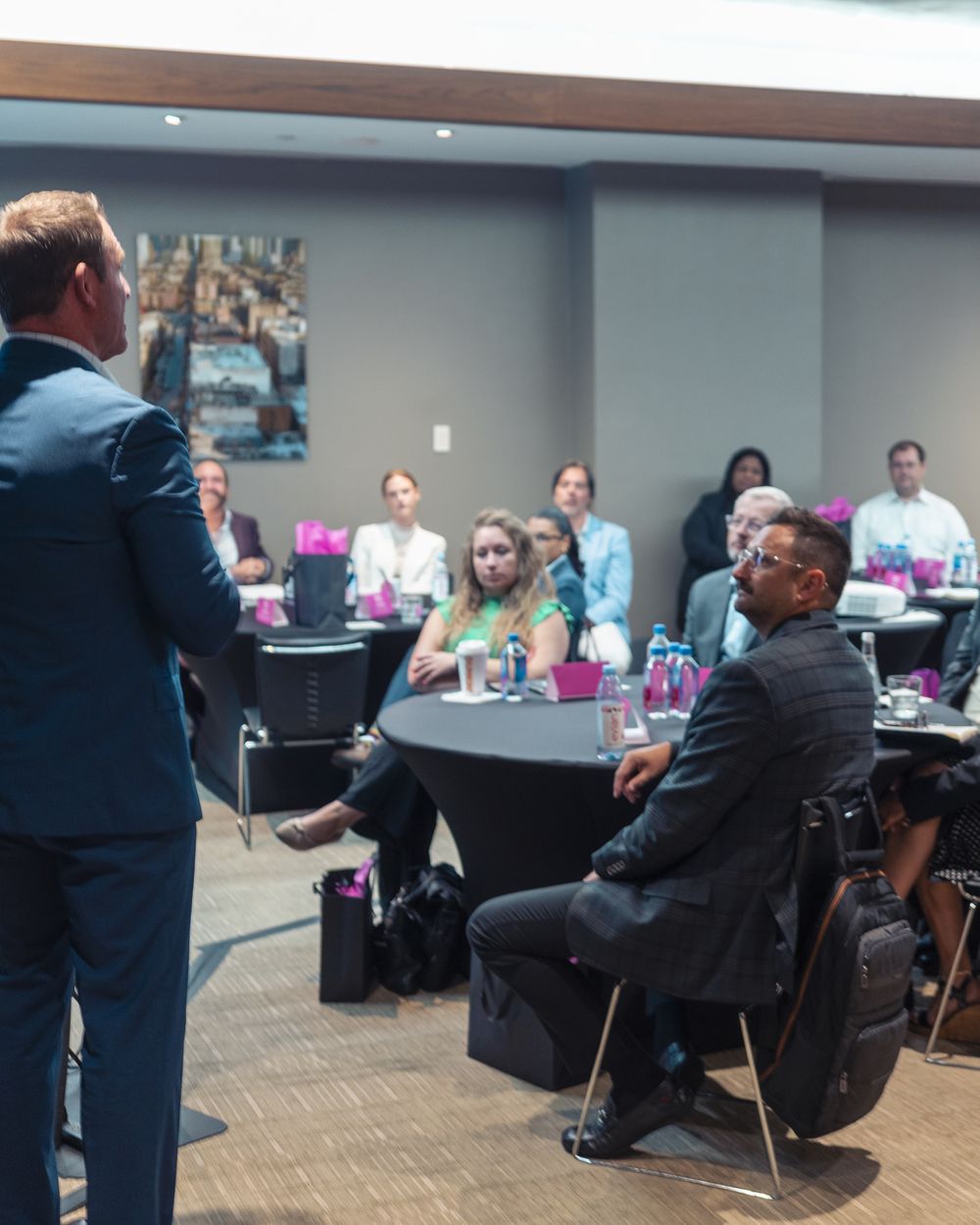 A Rebel leader presenting to hotel teams