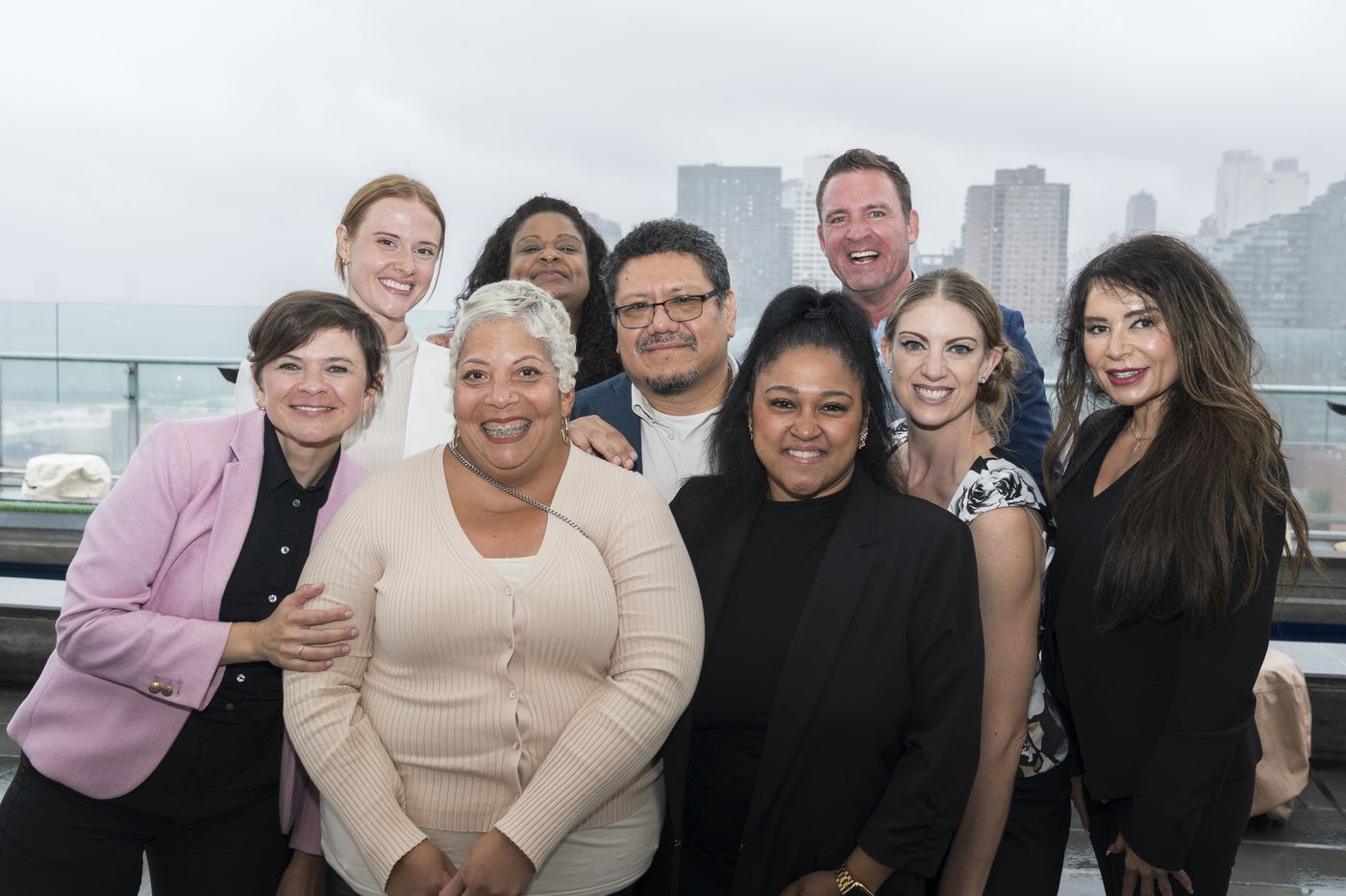 The Rebel team together on a Manhattan rooftop